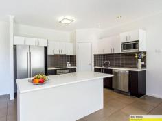  2 Macrusser Circuit Warner QLD 4500 Home Sweet Home… What a delightful home...modern and stylish, and with high ceilings throughout, this is certainly a value for money property. The WOW factor hits you as you step inside and realise that this is truly a home where everything is complete - there is no more money to spend - you can simply move in, relax and enjoy. Features include: * spacious air conditioned open plan living area  * modern well appointed kitchen with dishwasher and loads of cupboard space * 4 generous bedrooms - 3 air conditioned and with robes - all with fans * ensuite bathroom to master * immaculate family bathroom with deep bath  * lovely covered patio overlooking fenced, level rear yard * fenced front yard * double lock up remote garage * easy care gardens with water tank * security screens/doors throughout This home will suit all buyers from first home buyers, through to retirees, investors and families. Don't delay in arranging your inspection as properties of this quality, and with enough room for the kids and pets to play (as well as accommodating a trampoline/swings), will sell quickly. Contact the listing agent Kerri Smith at any time for all inspectons or queries. 