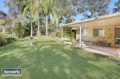  2 Rossleigh Ct Yugar QLD 4520 A wonderful blend of flat grassy play space and bush pathways winding through this gently sloping 1.5Ha (3.7 acres approx.) will keep your children amused and enjoying their new country lifestyle. Friends and family will love to gather in your outdoor entertaining area or gather around the open fire on those chilly evenings. A versatile and spotless galley style kitchen links the formal and informal areas, while the massive rumpus provides heaps of space for indoor play. There is even a three-bay shed for the man of the house. For your added consideration: Four good sized bedrooms all with built-ins and views to the outdoors Master bedroom with a walk-in robe and ensuite Formal living and dining with a fireplace Family dining adjacent to the kitchen and leading to the outdoors Generous undercover outdoor entertaining area Massive separate rumpus Galley style kitchen linking the areas Three bay shed Flat grassy play area and gardens around the house Fully fenced 1.5Ha with a dam Located only minutes from Samford Village and the vibrant café scene, plus organic shops and market, the Samford Pub - a favourite gathering place for locals, and the expanding local shopping centre, this home is just looking for a new family. Samford Village 	 4.2kms School bus pick-up 	 50m Samford State School 	 5.5kms Ferny Grove Station 	 12 minutes Yugar, as a suburb of the Samford Valley is a much sought after location for family living. Samford offers the choice of both larger and smaller acreage lifestyle blocks as part of a community centered around 'the Village'. The Samford State School, the Steiner School and the nearby Ferny Grove State High School offer educational choices for residents, and there is a full range of sporting facilities from equestrian, bowls, archery, cycling, and all the football codes including state of the art soccer fields.  