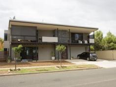  23 Albert St Swan Hill VIC 3585 $459,000 The "One" Worth Waiting For Architecturally designed and built by quality builder 'Rick Blake' this fabulous town residence ticks all the boxes.  With parklike rural views this property is situated on 'The Hill' in a sought after location. The home features tiled formal entry to lounge room, two bedrooms with built in robes and ultra modern bathroom with quality fit out and laundry. Upstairs is a huge open plan area with sweeping views, the designer kitchen includes under-bench oven, hot plates, dishwasher, large dining area and family room with doors leading to the deck area for alfresco dining. The main bedroom has a large ensuite and walk in robe. Refrigerated heating and cooling ensure year round comfort and the double garage looks after the vehicles. Inspection will delight.   Property Snapshot  Property Type: Townhouse Construction: Rendered Block Features: Built-In-Robes Dishwasher Ducted Cooling Ducted Heating Ensuite Family Room Lounge Walk-In-Robes 