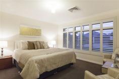  7 Conimbla Ln Aubin Grove WA 6164 Property Information Open Home Dates: Saturday 26 Sep 2:20 PM - 2:40 PM Sunday 27 Sep 2:20 PM - 2:40 PM FIXED DATE SALE ENDS 7th OCTOBER @ 4PM ALL OFFERS PRESENTED!! Magnificent in every sense, this luxurious residence is sure to impress. The property sprawls over a generous 608sqm block with multiple entertaining areas and lush landscaped gardens - taking family living and entertaining to a whole new level! First impressions offer perfectly manicured gardens and a grand facade leading to an impressive portico. Step inside to discover the most glamorous of family homes, where every detail has been carefully considered and realised with no expense spared.  A magnificent floor plan echoes the spacious allotment the home is set on with well-proportioned living areas, providing formal and casual designated spaces that span out to an equally impressive alfresco. Quality Spotted Gum timber flooring, high ceilings, beautiful colour schemes and rich finishes feature throughout the home, creating an allure that will not be denied. There is no shortage of space to ensure absolute comfort and convenience. This includes a sumptuous lounge/theatre room, large games room and a separate study or fifth bedroom, as well as the most impressive open plan living and dining domain encompassing the designer kitchen.  The centrally located modern kitchen will impress the fussiest of chef's, boasting state of the art appliances, banks of cupboards, Ceaser stone bench tops, overhead storage, induction cooktop, walk-in larder and large fridge recess. Server windows offer easy meal service to the alfresco making summer BBQ's and entertaining a breeze! There are four bedrooms offering the flexibility to accommodate the entire family and guests. All of the bedrooms are wonderfully sized with magnificent storage and stunning decor. This includes the lavish master room, complete with His and Her walk-in wardrobes and lavish ensuite featuring a double shower. The property is further enhanced by a separate powder room and laundry that is brilliantly equipped with intelligent storage solutions. Additional features include ducted reverse cycle air-conditioning, shoppers entry, LED lighting, security alarm, Crimsafe security doors, quality window treatments and a double lock-up garage with additional storage space and access to the rear yard.  Outside feels like an extension of the living accommodation with instant access to the fully paved alfresco - ideal for relaxation or simple family dining. The gardens are fully landscaped and reticulated and boasts a garden shed for extra storage.  Lifestyle and convenience are paramount with an abundance of parklands at your doorstep. Additionally, the property is very close to Aubin Grove Primary, the freeway, Transperth bus links, and close proximity to Cockburn Central and the upcoming Aubin Grove Train Station, making this place a well-connected family and commuter destination!  Please contact us for more information or to arrange a viewing. Property Type 	 House 