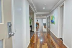  4A Allan St Buninyong VIC 3357 $629,000 Property ID 39872 This beautifully appointed and expansive family home is set-back off Allan Street offering secluded privacy, yet is only a few minutes walk to the local school, botanical gardens, and Buninyong village.Three spacious living areas provide an abundance of indoor options while an under cover alfresco and deck give lovely views over the well-established garden on this generous 2500m2 property. The main living room is complete with feature gas log fire.The king size master suite contains a walk-in robe and oversized luxe ensuite with spa. In the rear wing, an additional three bedrooms have built-in robes and are served by two more bathrooms (one an ensuite) and a powder room. The bright study is perfectly situated at the front of the house overlooking the wisteria draped front porch and fishpond. Each light filled room offers green visas into the gardens surrounding the home. An open plan entertainer's kitchen includes stone bench tops, walk-in pantry, in-built coffee machine, microwave and steam oven. This exceptional home provides all the luxuries you'd expect from a property of this standard including beautiful Spotted Gum polished floors, reverse cycle air-conditioning, central heating, ducted vacuum, cable internet and Foxtel. Two oversized double auto lock up garages provide ample storage and there is even a 27,500 litre water tank and solar hot water. The main garden offers rose filled garden beds and fruiting trees of lemon, quince, almond and walnuts. Take a seat in the gazebo retreat and you'll never want to leave. Land area 0.26Ha 