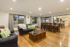  1 Bainbridge Ct Kilsyth VIC 3137 $520,000 Plus Family Appeal In A Well Serviced Locale Displaying an undeniably charming streetscape with its lush meticulous gardens and covered front deck enjoying the northerly aspect, this substantial family home on a large block of 873sqm (approx.) is at once, delightfully engaging. High ceilings and rich, polished floorboards add further appeal to the homes impressively presented interiors comprising a large formal lounge with a central sliding door ideally opening up or closing off the immense family zone and open plan meals area. Additionally, further sliding doors open out to a vast covered entertainer's patio affording views of the Dandenong Ranges, and the large secure rear gardens perfect for kids and pets to run around. Overseeing is the modern kitchen equipped with quality appliances including Westinghouse gas cooktop and electric oven with separate grill plus a Dishlex dishwasher, along with a double pantry and plentiful cabinetry. Comfortably accommodating the homes residents are four considerably sized bedrooms, all fitted with built-in robes and sharing the chic family bathroom featuring statement tiling and a semi-frameless shower, in addition to a deluxe full ensuite boasting dual vanities, feature tiling and a frameless double rainfall shower complementing the master bedroom with walk-in robe. Further benefits include gas ducted heating, reverse cycle air-conditioners to both living areas, ceiling fans, solar panels, fitted laundry with storage, roller blinds, separate toilet, tile roof re-pointed 2 years ago, garden shed, off-street parking, double carport and double gated access to secure parking for a trailer. Residing in an exceptionally well serviced location close to a choice of highly regarded schools, swim centre, Elizabeth Bridge Reserve, Churinga Village Shopping Centre and Mooroolbark with rail station, along with convenience to Croydon, Lilydale, the Yarra Valley and Ringwood with Eastland Shopping Centre and EastLink, this engaging abode is certain to impress. Enquire now! Features Built-In Robes Reverse Cycle Air Con Outdoor Entertainment Area Dishwasher Deck Floorboards Air Conditioning 