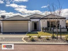  69 Bellazario Promenade Aveley WA 6069 FORGET THE HASSLES OF BUILDING Have you been tossing up between building and buying established? Well here is your solution.  Built a mere 18 months ago in 2013, this near new spacious family home is in the perfect location. The heart of the home is definitely the open plan kitchen, living and dining area with large windows and sliding door leading to the alfresco. Imagine the entertaining you could do in this space and the summer BBQ's in the large alfresco area! With 900ml stainless steel appliances and long island bench/breakfast bar this kitchen would be perfect for Sunday morning bacon and eggs or pancakes for the kids. A double fridge space, dishwasher recess and pantry just tops off this kitchen. Do you have a large family? No problem! With 4 large bedrooms, 2 bathrooms PLUS study you will definitely have room to spare. Family + movies + popcorn + ice-cream = the perfect Saturday night in your very own home theatre. Features include: -Ducted evaporative air-conditioning throughout with reverse cycle in master bedroom -Security alarm and remote double garage with shelf storage to maximize space -Low-maintenance reticulated garden -Close to all amenities; shopping centres, schools and lots more Don't miss the opportunity to be a part of this community! Last opportunity to view this beautiful HOME before AUCTION on SATURDAY & SUNDAY  ***AUCTION ONSITE 27th SEPTEMBER 2.00PM***   Property Snapshot  Property Type: House Features: Alarm Close to schools Close to Transport Ducted Heating Ensuite Formal Lounge Remote Control Garaging Study 