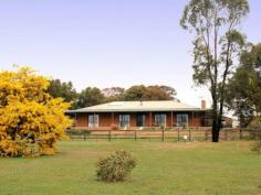  88 Hylands Ln Heathcote VIC 3523 $470,000 - $490,000 Views, Comfort, Convenience and Space! With beautiful views of the Mt Ida ranges and a wide wrap around verandah to enjoy them from, this attractive and comfortable home on 8ha (approx 20 acres) offers lovely polished timber floors, spacious living with reverse cycle air-con, open fire place and Coonara wood heater, Kitchen with good storage, corner pantry, dishwasher and breakfast bar, 3 bedrooms, main with ensuite and walk in robe, 3 piece family bathroom, separate toilet, large laundry with good storage plus a walk in linen cupboard. Outside offers a paved entertainment area, double carport plus large shed with workshop (3 phase power) and a storage shed with roller door. There are 2 dams, and 6 taps around the property can supply water pumped from the dam. Conveniently located approx. 5 minutes from Heathcote, this is an ideal lifestyle property - call Jackie on 0431 566 291 to arrange an inspection   Property Snapshot  Property Type: House Land Area: 8 ha Features: Built-In-Robes Dam Dishwasher Ensuite Fenced Garden Shed Lounge Outdoor Living Verandah Walk-In-Robes Water Tank Workshop 