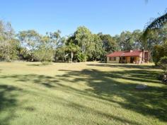  232 Esk-Hampton Rd Esk QLD 4312 $439,000 Vrede' - A Stunning 2 Acre Property Peaceful, Private, Tranquil...These are just 3 words that come to mind as I sat in the warm morning sunshine on the front pergola. Unique floor plan featuring all three carpeted bedrooms separated from one another allowing guests their own privacy, lounge room and easy access to verandahs. The kitchen features a servery into the main lounge room making entertaining effortless. Large separate office attached to the home providing an excellent opportunity for a home business, craft room or fourth bedroom also with verandah access. Other features include Cathedral ceilings, open fire place, floor tiles, security screening, air conditioning and ceiling fans in the main lounge room and main bedroom, plus WIR and large ensuite to master bedroom. Double Colorbond lockup garage + remote controlled door with concreted skirt, beautifully landscaped to the creek boundary with established trees and shrubs. Fantastic neighbourhood community. A very lovely property, well presented and worthy of your inspection. 