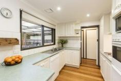  1 Bainbridge Ct Kilsyth VIC 3137 $520,000 Plus Family Appeal In A Well Serviced Locale Displaying an undeniably charming streetscape with its lush meticulous gardens and covered front deck enjoying the northerly aspect, this substantial family home on a large block of 873sqm (approx.) is at once, delightfully engaging. High ceilings and rich, polished floorboards add further appeal to the homes impressively presented interiors comprising a large formal lounge with a central sliding door ideally opening up or closing off the immense family zone and open plan meals area. Additionally, further sliding doors open out to a vast covered entertainer's patio affording views of the Dandenong Ranges, and the large secure rear gardens perfect for kids and pets to run around. Overseeing is the modern kitchen equipped with quality appliances including Westinghouse gas cooktop and electric oven with separate grill plus a Dishlex dishwasher, along with a double pantry and plentiful cabinetry. Comfortably accommodating the homes residents are four considerably sized bedrooms, all fitted with built-in robes and sharing the chic family bathroom featuring statement tiling and a semi-frameless shower, in addition to a deluxe full ensuite boasting dual vanities, feature tiling and a frameless double rainfall shower complementing the master bedroom with walk-in robe. Further benefits include gas ducted heating, reverse cycle air-conditioners to both living areas, ceiling fans, solar panels, fitted laundry with storage, roller blinds, separate toilet, tile roof re-pointed 2 years ago, garden shed, off-street parking, double carport and double gated access to secure parking for a trailer. Residing in an exceptionally well serviced location close to a choice of highly regarded schools, swim centre, Elizabeth Bridge Reserve, Churinga Village Shopping Centre and Mooroolbark with rail station, along with convenience to Croydon, Lilydale, the Yarra Valley and Ringwood with Eastland Shopping Centre and EastLink, this engaging abode is certain to impress. Enquire now! Features Built-In Robes Reverse Cycle Air Con Outdoor Entertainment Area Dishwasher Deck Floorboards Air Conditioning 