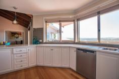  2 Gleneagles Ct Darley VIC 3340 $535,000 Located in a quiet pocket of the stunning Links estate is a classy 3 bedroom home set on a mammoth 1200 sqm (approx.) block with plenty to offer for the whole family. Let's start with the garage, spacious enough to hold 5 cars, it is huge! Plenty of room to use it as a workshop and it even has a mountain of space under the house to store items or to convert to a cellar! Internal access from the garage to the lower level of the home could be used as a study, small living area or even a games room. The first thing you notice when you make your way upstairs is the sophisticated polished timber boards throughout, giving the home a light and elegant feel.  The expansive kitchen overlooks the picturesque views of Bacchus Marsh and is fully equipped with Stainless Steel appliances including a built in Microwave, Dishwasher, 900mm Cooktop and Wall oven. Great sized pantry and stone benchtops, this is a MasterChef's dream! Not only is there a meals area right next to the kitchen, there is also a formal dining area which could also be used as a living space.  Come summertime, entertaining guests is a breeze! You have plenty of options, the oversized decking area with merbau decking is simply amazing as is the solar heated in ground pool, both of which overlook the township and its picturesque views. Property Overview Property ID: 1P2469 Property Type: House Land Size: 1200m² approx. Garage: 5 