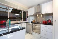  9 Dalray Pl Lilydale VIC 3140 $420,000 plus  Suprises In Store In Gateway Estate! Enjoying a prized position within the ever-popular and tightly-held 'Gateway' estate, this contemporary, quality home caters to a wide range of home-seekers including family's and executives, those looking to downsize in style as well as investors with a highly tenantable appeal residing close to Lilydale's main street, schools and transport. Situated in a private, cul-de-sac facing north and enjoying views of Lilydale's rolling hills; this modern home also presents an attractive facade beyond lush, blooming gardens. Decidedly deceptive from the outset, the size of this cleverly-designed home is not revealed until you step inside and can then appreciate the flowing and extensive floorplan. Plushly carpeted for a luxurious touch, a spacious formal lounge provides the perfect venue for relaxation, enjoying refrigerated air-conditioning sure to be appreciated in the warmer months, and extending through into a naturally light and generously sized meals area, tiled for easy clean-up and overseen by the sophisticated kitchen. This gourmet domain is ideally appointed with abundant glossy surfaces, plentiful chic cabinetry, a breakfast bar, stainless-steel splashbacks and appliances including a Fisher & Paykel dishwasher. Sliding doors allow entertaining to spill out to a fabulous covered patio perfect for dining alfresco, and the lush, landscaped gardens promoting family enjoyment and ideal for pets to play in a secure environment. Accentuating the homes appeal even further, a considerable rumpus or theatre room (wired for surround sound) also enjoys air-conditioning and access out to a second, central courtyard ensuring harmony for all. Supplying accommodation needs favourably, a large master bedroom benefits from ample robing and ensuite-effect to the bright, family-sized bathroom boasting a separate shower and a spa bath ensuring relaxation; in addition to the two further, robed bedrooms. Notable highlights also feature gas ducted heating, air-conditioning, ceiling fans, separate fitted laundry with external access, separate toilet, feature walls, good-sized garden shed, driveway parking and a remote double garage with rear roller-door access to central courtyard or secure trailer/boat parking. Ideally situated just a short walk to Lilydale Heights and Mt Lilydale Mercy Colleges, reserves and playgrounds, kinder and the vibrant township of Lilydale with plentiful shopping, cafes, sporting facilities, Melba Park and the ever-popular Lillydale Lake; plus Chirnside Park Shopping Centre and the delights of the Yarra Valley area all nearby. Call to arrange your inspection of this premier abode on 654sqm (approx.) today! Price Guide: $420,000 plus   |  Type: House  |  ID #323013 