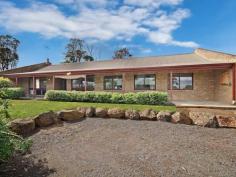  5 Knowles Ct Bannockburn VIC 3331 $379,000 Dream Location with Room to Move - 959mt2 Approx Fabulously featured in a very accessible position on just under a quarter acre, which is within easy walking distance to all of Bannockburn's many amenities.  This homes box of surprises contains two living areas and four bedrooms with BIR's and ceiling fans. The galley style laminate kitchen with electric cooking leads you through to the meals and family room, with feature brick wall, warmed by solid fuel heating and feature floating laminate flooring.  The main living area is light filled by a large window and also contains a ceiling fan. The family renovated bathroom is completed by modern neutral tones. There is also the option of using the sun room as either extra living or a perfect study spot. Exit the family room to a paved patio area with shade sail. At the rear of the property you will find established veggie gardens and concrete garden shed. This points to a home which would suit first home buyers, investors or a family ready to benefit from this well priced property.  Don't be the one to miss out! 