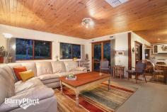  4 Trudy Pl Mt Evelyn VIC 3796 $890,000 plus Love At First Sight! Sale by SET DATE 29/9/2015 (unless sold prior) It would be hard to imagine a more idyllic family residence than this gorgeous, brick home poised upon an acre-and-a-half of beautifully landscaped, native gardens which deliver a lifestyle of comfort and enjoyment. Inspired with renowned 'Merchant Builders' style homes in mind, this lovely home effortlessly blends with the abounding greenery, and, via a profuse amount of glazing, frames glorious views from every room which allows the natural light inside, whilst several access points link internal areas with the fabulous outdoor recreation and entertaining spaces. Beautifully appointed and appealing, the homes extensive, flowing layout boasts a cosy sitting room looking out to the beautiful gardens, a vast sunken lounge showcasing Cathedral ceilings producing unique dimensions; as well as a blazing open brick fireplace (with inset guard), bluestone bar and near-new 100% New Zealand wool carpet adding a luxury touch, along with timber sliding doors accessing the central courtyard. Furthermore, there is also a considerable, carpeted rumpus and a tiled meals space or family zone ensuring family harmony - both areas opening for entertaining to flow out to the huge patio and gardens. An attractive 'country-style' kitchen is replete with plentiful cabinetry, a walk-in pantry and appliance cupboard plus modern surfaces and quality appliances including dishwasher; overseeing the living spaces for catering ease. Furthermore, there are also four sizeable bedrooms (or three robed and a private study), serviced by a spacious family bathroom with separate shower and bathtub, all bathrooms also feature heated towel racks. Outdoor enjoyment is assured with designated entertaining, recreation and vegetable gardens. Boasting a sparkling 150% solar-heated swimming pool and a mains gas-heated, 10-seater spa, sun/pool deck, gazebo, patio with mains-gas BBQ, fire-pit and extendable awning, plus chook house and run, segregated boxed veggie patches, wood-shed, a powered workshop or man-cave with wood-fire heater plus a wood-fire oven created out of natural stone, 27000lt water tanks with pumps, automatic irrigation system and a remote double garage with internal entry and an adjoining home-office, gym or fourth living space! Further notable highlights also include hydronic heating, evaporative and refrigerated cooling, ducted vacuum and alarm system, a huge fitted laundry ideal for drying clothes in winter, Foxtel dish, repointed Terracotta roof, internal Cedar doors and vogue lighting. Located in the bowl of a private court setting just minutes' walk to St Mary's and Mt Evelyn Primary's, child-care and kinder, the Warburton Trail and local shopping, with easy access to Lilydale amenities, shops and rail transport, the National Park ,Yarra Hills Secondary, wineries and restaurants, everything about this outstanding abode will be sure to instantly capture your heart. An inspection is the only way to discern all this spectacular home has to offer, enquire now! Features Study 