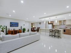  64 Monaco Circuit Epping VIC 3076 Wow 2 Master Bedrooms! Absolutely stunning in looks, be prepared to fall in love with this contemporary residence. This nearly new home has all the entertainment options you'll ever need...ready to be enjoyed by the entire family! From the moment you arrive at your dream destination, all the work has already been done. With refined quality throughout, the internal layout is saturated by natural light and offers a free flowing floor plan consisting formal entry, study/ office, comfortable lounge / theater, modern kitchen including wide stainless steel appliances, stone bench top & walk in pantry, open plan meals and family area. Boasting two beautiful hotel-style ensuites, the other large bedroom also has BIR and a sparkling central bathroom. The presence of huge outdoor area / alfresco with beautiful landscaped gardens highlights the home's practicality and functionality for everyday family living. Features are numerous and include ducted heating, cooling, alarm system, video intercom, high ceilings, quality window furnishings throughout, dishwasher, ducted vacuum, double remote garage, fully landscaped, solar panels (4.5kw) saving you $$'s and much more. There's simply too much to mention in words, only an inspection will do. Have a look today, before it sells! Photo ID Required. 