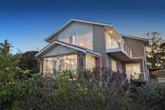  7 Damien Ct Watsonia North VIC 3087  $670,000 to $730,000  Impressive Views, Extraordinary Living!! Perched atop Watsonia North, capturing uninterrupted views across to The Dandenong Ranges, this homes boasts unrivalled living options fit for the whole family. The formal lounge and dining are bathed in natural light, while the huge kitchen offers loads of bench and cupboard space with adjoining meals area. A rear rumpus area allows great space for the kids to play as the adults entertain in the backyard pergola setting complete with spa. Upstairs showcases a parents retreat to die for as those amazing views compliment the living zone with balcony, large bedroom plus walk in robe and ensuite with corner spa. Four further bedroom downstairs, all with BIR's, include one with semi ensuite plus a central bathroom. Modern conveniences include ducted heating, evaporative cooling, ducted vacuum, dishwasher plus a double garage with extra full bathroom. A home loaded with everything you could want located within easy access to parklands, schools, transport and shops. This one is a must to inspect! Price Guide: $670,000 to $730,000   |  Type: House  |  ID #310222 