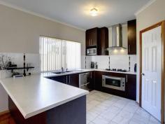  12 Yellow Gum Ave Athol Park SA 5012 $529,000 Modern 4 Bedroom Family Home! Modern Sterling 2009 built family home with quality fixtures and fittings ready and waiting for new owner. No expense spared as the home offers 280 sqm approx of main area including carport, alfresco and verandah. You will be nicely surprised from the moment you step into this big residence. To start with, there are 4 bedrooms or 3 plus study. Main bedroom has walk in robe and good sized ensuite, 2nd and 3rd bedrooms have built in robes. Well appointed lounge and dining area, modern kitchen with dishwasher and walk in pantry complete with family room and home theatre area. Sparkling main bathroom with bath and shower, separate toilet and vanity. Daikin central heating and cooling for all year round comfort, quality parquetry throughout and 2.7m ceilings. Other features include solar power, alfresco entertaining area and good sized rear yard. Ample car park off the street with double garage as a bonus. Land area 585 sqm approx. Contact agent Denis Bajraktarevic 0421 915 013 to arrange inspection. 