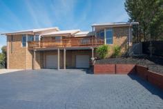  2 Gleneagles Ct Darley VIC 3340 $535,000 Located in a quiet pocket of the stunning Links estate is a classy 3 bedroom home set on a mammoth 1200 sqm (approx.) block with plenty to offer for the whole family. Let's start with the garage, spacious enough to hold 5 cars, it is huge! Plenty of room to use it as a workshop and it even has a mountain of space under the house to store items or to convert to a cellar! Internal access from the garage to the lower level of the home could be used as a study, small living area or even a games room. The first thing you notice when you make your way upstairs is the sophisticated polished timber boards throughout, giving the home a light and elegant feel.  The expansive kitchen overlooks the picturesque views of Bacchus Marsh and is fully equipped with Stainless Steel appliances including a built in Microwave, Dishwasher, 900mm Cooktop and Wall oven. Great sized pantry and stone benchtops, this is a MasterChef's dream! Not only is there a meals area right next to the kitchen, there is also a formal dining area which could also be used as a living space.  Come summertime, entertaining guests is a breeze! You have plenty of options, the oversized decking area with merbau decking is simply amazing as is the solar heated in ground pool, both of which overlook the township and its picturesque views. Property Overview Property ID: 1P2469 Property Type: House Land Size: 1200m² approx. Garage: 5 
