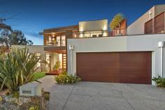  18 Canberra Ave Berwick VIC 3806 $820,000  Price Guide: Buyers over $820,000   |  Land: 516 sqm approx 	  |  Type: House  |  ID #316680 The Best of Bryn Mawr Masterfully crafted and situated in the prestigious Bryn Mawr Estate, this stunning double storey home ticks all of the boxes. Located within Berwick's most sought after school zone, only a moment's walk to the Berwick Village, and overlooking the Bryn Mawr wetlands, the location is 10 out of 10. Downstairs accommodation includes 3 generous bedrooms, all with built in robes, a communal bathroom and separate powder room plus a large formal living area. Upstairs offers an additional large living and dining area and a kitchen complete with waterfall stone benchtops, top end stainless appliances and a servery window to the balcony with breathtaking views. The master bedroom is also nestled upstairs with full ensuite and walk in robe. Outdoor entertaining is second to none featuring a north facing alfresco with kitchenette overlooking the captivating resort style swimming pool. Creature comforts include gas ducted heating, refrigerated air conditioning, gas log fire place and all positioned on a 516m2 (approx.) parcel of land. This is an exceptional opportunity to secure a magnificent home, so call today for your inspection. Features Ducted Heating Built-In Robes Outdoor Entertainment Area Dishwasher Remote Garage Pool (In-Ground) 