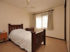  24 Boomerang Pl Heathcote VIC 3523 $240,000 Rural Town Position, Views + Hi-Span Shed This 3 bedroom sweetie has been lovingly cared for and it shows. Situated on a quarter acre to allow easy access and extra parking for caravan, boat etc. and with a terrific Hi-span shed with concrete floor and power. This comfortable home has a neat 3 peice bathroom, separate WC and roomy kitchen with gas upright stove, rangehood, period range with brick surround/chimney (not in use) and both a single + corner walk in pantry, breakfast bar and meals area. All 3 bedrooms have ceiling fans and triple door built in robes, while the spacious lounge has a reverse cycle split system air-conditioner, solid fuel heater and a gas heater.  On town water, plus there are also 2 rainwater tanks plumbed to the kitchen, all windows have window locks and canvas sun awnings and the home has been re-blocked with concrete stumps. Close to town amenities yet with a country feel and McIvor Ranges views.  To view phone Ingrid on 0425 760 460   Property Snapshot  Property Type: House Construction: Brick Veneer Land Area: 1,032 m2 Features: Ceiling Fans Shedding Water Tank 
