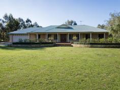  58 Egerton Dr Serpentine WA 6125 WOW factor on 2 1/2 Acres House - Property ID: 814535 Impressive country style home with loads of quality features throughout. A kitchen to die for, a man sized shed, cool pool for the summer months and loads of room for your pony, sheep, goats and chickens!  Features Include 4 Double bedrooms (built in robes)  2 bathrooms, En-suite with a spa  Chefs kitchen/stainless steel appliances with loads of storage and granite bench tops 32 course ceilings  Laminate timber floors Theatre Room Open Plan living Combustion heater plus split system Air/con Outdoor entertainment area with outdoor kitchen BBQ Salt water pool Man size shed 9x16m shed/workshop double bay entry front and side  Bore, retic Backs onto golf course, bridal paths, lifestyle awaits and you will love it!   Print Brochure Email Alerts Features  Land Size Approx. - 1.15 hectares  Built-In Wardrobes  Close to Schools  Close to Shops  Fireplace(s)  Garden  Secure Parking 