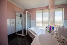  40 Hospital Ave Manjimup WA 6258 $460,000 Ultimate family home with amazing patio and sheds, situated on 2051m2 House - Property ID: 814703 This property boasts size!! With a comfortable modern brick and tile home built by Parella Bros. that features 4 bedrooms and 2 bathrooms. The master bedroom is of large size with a beautiful bay window, walk in robe and ensuite that is well finished and even includes a spa. The other three bedrooms are all of medium size with built in robes and vinyl flooring, perfect for a young family.  Open style living with the kitchen working in perfectly with the dining and the family room. The kitchen is well sized with a 900mm stainless steel electric oven and gas cook top with matching stainless steel range hood. A double pantry and open fridge bay of which will also accommodate your freezer. Fantastically designed with shoppers entrance from the double carport at the front. The living area has a wood fire, ceiling fan and sliding glass door access to the patio, perfect for your entertainment requirements. Separate to this open living is the formal lounge which is perfectly tucked away and like the entire home has beautiful large windows to soak up this beautiful block. This 2051m2 block is set up so well. With the double carport leading to a large "L" shaped patio area of nearly 150m2. There is secondary access to the property that leads to the sheds, the main shed is 6m x 12m with cement floor. This shed features both 10 and 15 amp power outlets. The second shed is 3m x 12m and 4.5m high with cement floor, perfect for your caravan or boat.  With all this there is still plenty of space out the back and at the front of the home for your children or pets. The back yard is fully enclosed with quality fences. With the added convenience of a solar hot water system which also runs through the wood fire (and additional electric booster), batts insulated ceiling and recently replaced gutters and down pipes what more could you ask for. This property has everything a family could wish for. Don't miss out on such a fantastic opportunity.   Print Brochure Email Alerts Features  Land Size Approx. - 2051 m2  Built-In Wardrobes  Close to Schools  Close to Shops  Close to Transport  Fireplace(s) 