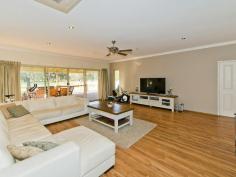  58 Egerton Dr Serpentine WA 6125 WOW factor on 2 1/2 Acres House - Property ID: 814535 Impressive country style home with loads of quality features throughout. A kitchen to die for, a man sized shed, cool pool for the summer months and loads of room for your pony, sheep, goats and chickens!  Features Include 4 Double bedrooms (built in robes)  2 bathrooms, En-suite with a spa  Chefs kitchen/stainless steel appliances with loads of storage and granite bench tops 32 course ceilings  Laminate timber floors Theatre Room Open Plan living Combustion heater plus split system Air/con Outdoor entertainment area with outdoor kitchen BBQ Salt water pool Man size shed 9x16m shed/workshop double bay entry front and side  Bore, retic Backs onto golf course, bridal paths, lifestyle awaits and you will love it!   Print Brochure Email Alerts Features  Land Size Approx. - 1.15 hectares  Built-In Wardrobes  Close to Schools  Close to Shops  Fireplace(s)  Garden  Secure Parking 