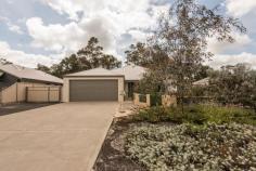  8 Kwenda Loop Capel WA 6271 $465,000 WOW, WOW AND MORE WOW!!! House - Property ID: 817657 LOOK no furtherJust listed this absolutely stunning family home in the sought after Goodwood Estate in Capel. A Country builder designed and built home on a MASSIVE 1334m2 block. Set amongst beautiful native gardens and trees, the home generates a sense of individuality from the moment you step onto the property. STEP through the front door into a generous entry with additional shopping access from the double garage. The home has 3 generous size bedrooms plus study with the potential for the study to be used as a 4th bedroom or baby's nursery.  WALK through to the open plan kitchen, dining and family room where you have fabulous views of the rear garden through each window. Being the central hub of the home you can enjoy the view while you cook, entertain or simply relax. COOK in the well-appointed kitchen with beautiful custom built Tasmanian Oak cabinetry with soft closing doors, dishwasher and quality appliances and large walk-in-pantry. RELAX in the additional well-designed fully enclosed and powered 6x5m sunroom which has been created for all-weather use. Make the most of this outdoor room all year round, great for entertaining, children's playroom, studio or whatever your imagination can create. TINKER in your very own powered colorbond shed with convenient side access and hot mix driveway. This magnificent property has so much more to offer and viewing is an absolute must BE QUICK as it won't last long - CALL Ros 0427 711099 or Rae -0411 413057 TODAY! *Massive 1334m2 block being the largest block in the current stage of this estate *3 generous size bedrooms Plus study *Plenty of storage *Quality tiling throughout *Fully ducted evaporative air conditioning *Reverse cycle air conditioning plus gas bayonet *Insulation *Easy care native gardens *Reticulation to front garden *Double lockup garage with shoppers access *Roller shutters to front and main bedroom windows *Solar HWS with gas booster, plus additional 12 solar panels for power collection *Raised vegetable garden beds *Hot mix driveway and side access to 4x5m colorbond powered shed *Paved and concreted walkways surrounding the home   Print Brochure Email Alerts Features  Land Size Approx. - 1334 m2  Garden  Secure Parking 