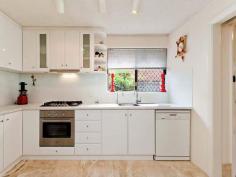  4/5 Elliott Road Claremont WA 6010  $780,000 Tranquil Townhouse LivingThis renovated 2 storey, townhouse is nestled in the secluded gardens of a delightful complex opposite Lake Claremont. This well designed townhouse has its entertaining and living areas on the ground floor. On entering, one is greeted with a spacious open plan living and dining room that has views to both the secluded front garden and the rear private courtyard. The lounge room opens onto the courtyard through floor to ceiling sliding glass doors. Entertaining is easy - the modern streamlined kitchen is readily accessible to these rooms as well as to the private rear courtyard.  The ground floor features include:  * Spacious, open plan dining/lounge room; * Large modern kitchen; * Downstairs toilet;  * Separate laundry; * Air conditioning; * Private, paved courtyard with established terraced gardens;  * Lush secluded front garden; and * 1 Carport. The second storey features include: * Main bedroom with balcony overlooking a private courtyard; * 2 large bedrooms, one with built in robes; and * Bathroom and toilet. The stairs to the second floor are located to the left of the entrance hall and provide extra storage. Only the bedrooms and bathroom are located on this floor thus ensuring your privacy. The master bedroom is well proportioned with built in robes. View your private courtyard from your bedroom or the bedroom's dedicated balcony. The other spacious bedrooms, one with built in robes also have garden outlooks. Enjoy the Claremont lifestyle in this unique parkland location. You have the choice of relaxing in quiet surrounds and strolling around the corner to a great coffee shop. You are also conveniently close to transport, schools and the many boutiques in Bay View Terrace and the Claremont Quarter. 