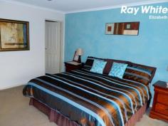  60 Peerless Rd Munno Para West SA 5115 $409,000-$429,000 Very Big and Very Beautiful Open: Sun 11th Oct 3.00 - 3.30pm With 5 big bedrooms and loads and loads of living space you will not be disappointed! As you step inside you enter the large formal entrance with tiled flooring, this continues throughout all the traffic areas of the home making cleaning up a breeze. Flowing on from the entrance you will find the fantastic sized formal lounge with feature bulk head ceilings. The gas kitchen is huge and includes all the "I wants" such as walk-in corner pantry, dishwasher and loads of cupboard space. The kitchen overlooks the massive modern open plan family and meals area and provides easy access to the rumpus room which is big enough to be used as 2 extra bedrooms or for whatever you may possibly need. The master bedroom is massive and includes a walk-in robe and beautiful spacious ensuite with spa bath. The remaining bedrooms are all double sized rooms perfect for a growing family. There is plenty of room for clothes and toys with bed 3 featuring a walk-in robe while bedrooms 4 and 5 have built-in robes. The home has a traditional and desirable 3-way main bathroom which will make getting ready super easy and with ducted heating and ducted cooling throughout you will be in total comfort control all year round. Outside begins with beautiful established low maintenance front yard with gorgeous street appeal and a double carport with automatic doors. You will love entertaining under the big gable undercover entertaining area which features a gas plumbed BBQ, this area is perfect for those special occasions with friends and loved ones. Outside also includes a good sized garden shed, grassed area for kids and dogs to play and rainwater tanks. This amazing property needs someone who wants the best of the big homes and the biggest of the best homes. It will certainly impress all who view! Call me today to arrange a viewing or come and see me at the next open for inspection; it will be an absolute pleasure to show you this wonderful and very large special home. David Smith 0405 418 216 Ray White Elizabeth: the number one Real Estate Agents / Sale Agents and Property Management in South Australia. Specialists in: Andrews Farm, Angle Vale, Blakeview, Burton, Craigmore, Davoren Park, Elizabeth, Gawler, Hillbank, Munno Para, One Tree Hill, Parafield, Para Hills, Paralowie, Salisbury, Smithfield. Disclaimer: Every care has been taken to verify the correctness of all details used in this advertisement. However no warranty or representative is given or made as to the correctness of information supplied and neither the owners nor their agent can accept responsibility for error or omissions. 