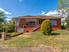  9 Wyndham Rd Claremont TAS 7011 A fantastic opportunity awaits in the heart of Claremont. If you are looking for a spacious family home then this is it! Consisting of 3 large bedrooms all with built-ins and a rumpus room located downstairs that could be converted into a 4th bedroom.  The expansive open plan living/dining/kitchen area is well designed to suit families or couples that like to entertain guests or extended family members on a regular basis. Feel at ease with private security roller shutters on the front windows of the property. The backyard is easily accessible through the tandem internal garage with rear single roller door opening up to a tidy, easy maintenance yard perfect for children and pets to play with the potential to build a unit S.T.C.A. The location is convenient and situated on a public transport route, a short stroll to Wyndham Road's retail centre and within walking distance or quick drive to Claremont Village Shopping Complex.  - Solid brick home with exciting potential  - Sunny open plan living area  - Double garage with heaps of storage  - Low maintenance gardens  - Close to schools, shops and transport  Year Built: 1970  Construction: Brick Veneer  Heating: Heat-pump and Wood Property Facts Petrusma Property id: 9wyndham House size: 144.0m² (approx) Land size: 905.0m² (approx) Property type: House 