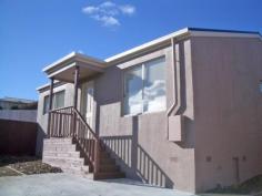  2/5 Aloomba Place Herdsmans Cove TAS 7030 $140,000 - $160,000* Good quality two bedroom rear villa (two on site only) priced to sell with strong returns for investors! This unit has great water views of the river to Mt Wellington as a backdrop and is situated in a quiet cul-de-sac. Surprisingly spacious living is afforded by the open plan living and dining room, lovely modern gloss kitchen with stainless steel appliances, sparkling bathroom offering two-way access to the master bedroom with built-in robe. The second double bedroom also has built-in robe, while each room has electric heating. There is a private fully fenced back yard plus additional car space with plenty of room for children and pets to play securely. Increased capital growth is arguably due soon in Hobart suburbs so now would be a great time to buy! Investors should consider with income from day one with an existing lease of $205 per week and around 7% yield in place. Also, being 2008 built, the balance of depreciation benefits may still apply. Make an offer today ? motivated Vendor! * This is a Buyer's Guide Inspections Inspections by appointment only. Features General Features Property Type: Townhouse Bedrooms: 2 Bathrooms: 1 Land Size: 473 m2 (approx) Indoor Living Areas: 1 Toilets: 1 Built in Wardrobes Outdoor Open Car Spaces: 2 Deck Fully Fenced 