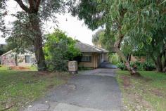  54 Carrick St Woodlands WA 6018 $900K WOOLDANDSThis is probably the worst house in the street but arguably one of the best blocks! This is probably the worst house in the street but arguably one of the best blocks! It is not often that a prime 708m2 building site on the hill in Woodlands, with views to Jackadder Lake and city views, comes onto the market. It is located in a quiet street, centrally located in this suburb, and is accessible to everything including: * Woodlands Shopping Centre is 600 metres away; * Woodlands Primary School is 320 metres away; * Holy Rosary Primary School is less than 200 metres away; * Hale School playing fields are just up Rosewood Avenue; * Churchlands High School is 1.3 kilometers away; and * Newman College is 2.4 kilometres away. Not ready to build immediately? You get a bonus 1967 brick and tile, three bedroom and study, one bathroom house, with a two car carport. The property has some appealing features: * A large light-filled open plan lounge/dining room with parquetry floors and expansive views to the city from the back windows; * A large kitchen with a large separate pantry waiting to be modernized; * The living areas have access to a large back balcony with suburban views; * A large main bedroom with a walk in wardrobe large enough to be converted into an ensuite.  * The renovation is made easier because the walk in wardrobe is adjacent to the existing bathroom; * Three other minor bedrooms, two of generous proportions, one with built in wardrobes and the other with a walk in wardrobe. The third has been converted into a study, but could be readily used as a fourth bedroom; * A large bathroom, and separate toilet; * A large laundry with backyard access;  * Original wooden floorboards; * A large backyard; and  * A double car carport. You will not be paying extra for tasteless renovations because there are none. Just an honest original house! 