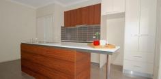 8/58 Hurley Street Mawson ACT 2607 $460,000 Looking for a single level townhouse in prime location? Look no further, this beautiful modern two bedroom home is positioned within 5 minutes to Mawson Shops, 20 minutes to Woden Plaza and 2 minutes to direct public transport. Not only is the location convenient, the townhouse itself has a practical layout providing spacious living, a single level design and a wonderful outdoor area to enjoy. Features: - EER 5.0 - Two spacious bedrooms both with built in robes -Bedroom one is segregated with an ensuite -Separate main bathroom -Lovely high ceilings throughout, spacious design -Open plan living -Single level -Contemporary kitchen with dishwasher, plenty of prep space and ample storage -Double doors open out to a spacious merbau deck with additional garden space, side entry and gate access to the shops -Walking distance to Mawson Shops, Woden Plaza, Schools and public transport -Double linen press -Underground parking for two cars. Visitor parking is also secure -Secure storage -Reverse cycle heating and cooling -Nothing to do at all! For a home hard to find providing a prime location call our 24 hour Home Buyer Hotline now on 6231 3100.   Open for Inspection at a time to suit you.   If you want to buy and are having difficulty finding the right home try our free Home Finder service. Just call 6231 3100 and we will do the rest. 