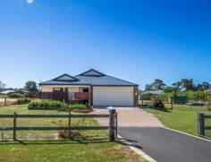  17 Fitzroy Link Vasse WA 6280 $575,000 Property ID: #2941568 PERFECT COMBINATION OF LIFESTYLE AND LOCATION 4 2 2 Here is your chance to live a unique country lifestyle, yet just minutes from popular schools, The Busselton CBD, the beach and all the Southwest attractions. This two year old home is positioned on an idyllic north facing 2015sq m block and is a versatile expression of family friendly living. At the heart of the layout an impeccably presented light filled kitchen adjoins the open plan living and dining area encouraging family gathering and entertaining. Bedrooms are positioned for a degree of privacy and separation and include a plush master bedroom with private ensuite and walk in robe, with three generously proportioned minor bedrooms with built in robes.  The north facing park size garden provides heaps of room for entertainment or play and you will soon reap reward from the wide range of fruit trees. Decorated in neutral tones, with easy care durable finishes and built to be extra energy efficient this home offers the promise of country ambience in a convenient location. Other features include: - loads of side access and plenty of room for the future shed - BGC built brick and colourbond home - high efficiency build to reduce energy bills - secure two car garage - wood look ceiling fans throughout - quality fittings and window treatments - 900 mm appliances in kitchen - reticulation to most garden beds   Inspection Times 2:00pm - 2:45pm Saturday, 31 October 2015 Land Size 2015 m2 