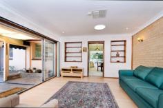 1 Juwin St Aranda ACT 2614 $820,000+ FIRST SALE IN 47 YEARS! Offering an ultra-convenient location opposite parkland, peaceful bush surrounds, fantastic schools and a community of like-minded neighbours - it's little wonder the tightly held suburb of Aranda is at the top of every buyers wish list. Beautifully maintained inside and out by the same original owner and located in the quietest of cul-de-sacs, this immaculate north facing four bedroom home exudes charm with elegant front gardens and attractive street appeal. The gorgeous gardens are brimming with flowering trees and shrubbery that lead you up the path to the front door where you are greeted with a spacious and inviting enclosed entry. Stepping inside the floor plan offers generous living areas that have been perfectly designed to make the most of the northern sun with large windows in the living areas and bedrooms that overlook the parkland and soak up the morning sunshine. The delightful kitchen is filled with natural sunlight and overlooks the rear garden, perfect for watching the children play as you cook dinner. The adjoining family room can be segregated from the living room with sliding decorative glass doors and also opens to the extended rumpus room with Tasmanian ash floor boards. The rumpus room has its own bathroom with shower, vanity and wc with an additional door allowing access from the backyard. Off the hall are four bedrooms, including the master and bedrooms two and three all with built-in robes and north facing windows overlooking the front yard and parkland. There's also a generous family bathroom with bath tub, separate wc and a large laundry. The back garden is filled with beautiful flowers and fruit trees; a real treat for parents and children alike. The tiered garden beds offer individual spaces for playing and relaxing plus there is also a paved entertaining area and covered pergola. The double carport has been lined with mature ivy creating shade and a distinctive feature wall.  With easy access to the University of Canberra, Radford College, Calvary Hospital and Jamison, this immaculate family home is sure to create excitement amongst discerning buyers. All this and more in a quiet, elevated street with established sprawling gardens and a family-friendly floor plan. EER: 2.0 Features: First sale in 47 years North facing four bedroom home Peaceful location opposite parkland Beautifully maintained inside and out Enclosed front entry Modern kitchen with dishwasher Four spacious bedrooms Two bathrooms Large sun-filled living room Separate family/casual meals off kitchen Extended rumpus room leads to rear yard Rear covered pergola Workshop area/garden room Enormous under-house storage Established gardens & fruit trees Ducted electric heating Ducted evaporative cooling Double carport Roof  repointed in February 2015 Located opposite a children's playground and park Land value: UV $550,000 Block size: 955m2 House size: 162m2 Enclosed front verandah: 17m2 Pergola: 10m2 Carport: 35m2 Additional info Property TypeHouse SuburbAranda Bed4 Bath2 Car2 price$820,000+ Block size954.6m2 approx. Size162m2 approx. 