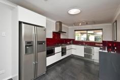  27 Rodgers St Greenwood WA 6024 $659,000 This home has everything a family could want. Sitting on an approximate 731m2 block this spacious 4 x 2 home with a below ground pool is loaded with value! With 4 good size rooms, 2 living areas, fully renovated kitchen and bathroom, below ground salt water pool, pitched patio and powered shed there is nothing else you will need. Situated on a quiet street with easy access to Kingsway Shopping Centre, Warwick shops, Warwick Road, Reid Highway and the Mitchell Freeway. Walking distance to the nearest bus stop that will take you directly to Whitfords and Warwick train stations. Warwick Senior High School and Greenwood Primary School is just a short distance away. This home must be viewed!!  •Tiled entry •Large sunken lounge room •Fully renovated kitchen with German design cupboards, plumbed in fridge freezer, stainless steel dishwasher and built in microwave with stainless steel trim •4 good size rooms with built in robes and carpet flooring •Meals and Family area adjacent to kitchen •Main bathroom fully renovated with glass door shower and double floating sinks •Second bathroom with separate toilet, shower and vanity incorporated in the laundry •Ducted Air Conditioning throughout •Salt water below ground pool •Powered shed •Garden reticulation •Pitched patio and shade sails •Security alarm system Call now to view! Won’t last long!! 