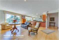  6 Minehan Pl Calwell ACT 2905 Positioned in one of Calwells best locations, with outstanding Views! With the owners moving north an outstanding opportunity exists for one lucky buyer to purchase an impressive home. Set aside some time to come and view this immaculate property. Located in an elevated quiet cul-de-sac on a large but maintenance friendly 1,603m2 block, this is an striking home of design and construction. Exceptional views to the north are the first thing to capture your attention but to truly appreciate this home you need to have a look inside. Split level living at its finest with four double sized bedrooms, study, lounge, dining, family, rumpus and living rooms. With good quality floor covering, fitting and fixtures this home is sure to please the astute purchaser. When venturing outside you will be amazed with not just the views but the impressive attention to detail with an outstanding garden with many chill out zones • First time offered for sale • 	 Large home with four bedrooms and ensuite and rumpus room. • 	 Huge 1603m2 parcel of land with views to Black mountain tower • 	 Flexible floorplan complete with a variety of living areas • 	 North facing solar passive living areas with views • Large paved outdoor living area • 	 In-floor zoned heating  • 	 Bay window meals area • 	 Large kitchen with breakfast bar and gas cooking • 	 Extra-large double garage with internal access and remote control doors • 	 Immaculate condition inside and out Residence 271.79m2 Garage 55.25m2 Total 327.04m2 Inspection is highly recommended! Additional Information Land Area (approx) 1603 sqm Building Size (approx) 327.04 sqm Energy Rating 2.0 