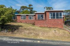  9 Birngana Ave Sandy Bay TAS 7005 $600,000+  Stunning water viewsBuyers looking in the $600,000+ price range3 1 1  Bathed in sun and offering absolutely spectacular water views of the River Derwent all the way to the bridge, this well positioned three bedroom home offers multiple living areas and emanates a classic 1960s vibe. Light and warm semi open plan living comprising a spacious galley style kitchen, dining and family room with sliding door onto a deck overlooking the river, in addition to a generous lounge room again with magnificent views and stone fireplace provides ample room for professional couples or young families. Three double bedrooms with BIR all enjoy extensive glazing capitalising on the home's sunny aspect and are serviced by an original retro bathroom. Positioned on a generous allotment of 782m2 with low maintenance gardens, a single garage and carport and driveway with OSP for several vehicles provides amenity. This is a fabulous home with great bones and an excellent opportunity for those looking to enter the market in Sandy Bay. reference: 	 333926 building size: 	 154.00 sq m property type: 	 Residential land size: 	 782.00 sq m 