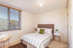  6/78 Hodgson Crescent Pearce ACT 2607 $305,000 AN OUTLOOK INTO THE TREE TOP CANOPY With its stunning outlook into the treetop canopy and its sun drenched northerly aspect, this freshly painted two bedroom unit located on the top floor of the quiet 'Wirreanda' apartments in Pearce, is a wonderful opportunity for you to purchase your first home or gain a low maintenance addition to your investment portfolio. Recently redecorated with a new oak laminate floating floor with acoustic underlay installed in the living/dining area. Enjoy the outstanding view of the Woden Valley from the balcony. The kitchen has plenty of cupboard space, an electric cook top and oven with a vented exhaust.  Both bedrooms have double glazed windows to aid with temperature control. Bedroom 1 has a built in robe and bedroom 2 has built in hanging and shelf space. The bathroom with shower, vanity and toilet is combined with the laundry facilities.  There is plenty of scope to add your own colour palate as the décor is very neutral with soft, earthy tones to complement the natural light. Car accommodation is provided with a single allocated carport. Just footsteps away you will find the Pearce shops and public transport. The Woden Shopping Plaza and Canberra Hospital are only a short drive as are the local primary school, Marist College and Melrose High School. The suburb of Pearce is named after the longest-serving Senator and longest-serving Minister in Australia's federal history, Sir George Pearce. Features: Treetop canopy outlook with sun drenched northerly aspect Lounge/dining room with new oak laminate floating floor Kitchen with plenty of cupboard space, electric cook top and oven Wall mounted reverse cycle air conditioner to lounge/dining room Built I robe to bedroom 1 Shelf and hanging space to bedroom 2 Combined bathroom and laundry facilities Covered allocated car parking space Footsteps to the Pearce shops and public transport EER 4 Body corporate levies $711.70 per quarter  Rates $277 per quarter Living space 70.43 sqm approx Land value (entire block): $2,734,000 (approx) Land size (entire block): 3,982 sqm (approx) Inspection Times: 11.45AM - 12.30PM Sunday, 18 October 2015 12.30PM - 01.00PM Wednesday, 21 October 2015 EER: 4.0  Unimproved Value (approx.): $2,734,000 