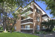  2/8 Chandos Street Ashfield NSW 2131 Peaceful and private garden apartment Fresh interiors, plentiful outdoor living space and a spacious layout give this ground floor apartment a cottage-like feel. One of only nine in the well-kept Locksley Hall, this 85sqm apartment benefits from direct level access to leafy common gardens and is just 450m to the station and Ashfield Park. • Quiet and private setting in a tightly held security block • Easy level access, an affordable alternative to a semi • 2 large bedrooms with built-ins and a leafy garden outlook • Freshly schemed interiors, separate living and dining zones • Bright and spacious kitchen with an adjoining laundry room • Paved outdoor dining terrace overlooking a leafy garden  • Easy internal access to a lock-up garage, low strata levies  • Bright and airy with potential to renovate and add value 