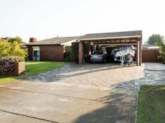  11 Chivalry Way Thornlie WA 6108 $549,000 Be quick to secure this quality built family home by master builder Malcolm Bell, beautifully maintained with pride by original owners in the very popular Castleglen Estate. Perfectly positioned to maximise the full use of the 680m2 block is this four bedroom two bathroom home with bonus study and games room for the growing family and within close proximity to schools, shops and public transport. Features Grand Master bedroom with split system air conditioner, roller shutter, walk in robe and fully tiled ensuite Three good size bedrooms all have built in robes Study/Nursery Formal dining and living with raked ceilings and wood combustion heater Modernised kitchen overlooking the outdoor entertaining area and complete with gas cook top and wall oven, pantry and loads of cupboard space and breakfast bar. Tiled casual meals and living area is spacious and leads you to the games room Gable patio outdoor entertaining area off the games room overlooks the creatively designed salt water pool Double carport with bonus side access for the boat Manicured gardens and lawns are fully reticulated from its own bore New carpets to bedrooms and formal areas Freshly painted Evaporative air conditioning Security system Ducted vacuum system Roller shutters Two garden sheds 