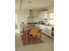  3 Estuary View Rd Dawesville WA 6211 $575,000 It is my pleasure to offer this ideal holiday home to the market. Perched on a hill overlooking the estuary is this fantastic holiday home.  On a 1062 sqm block, it has been stylishly renovated to introduce more space and light.  The two-storey house is beautifully presented and well maintained.  Downstairs is a huge second bedroom, bathroom, laundry and cupboard space.  Upstairs, the newly renovated kitchen is a real treat, with ample cupboard and bench space and a quality stand-alone cooker.  It overlooks a living area with a wood-fired heater in the corner.  Louvered windows allow fresh sea breezes to flow through the home.  The living area is open and adjacent to a dining area.  The main bedroom has a stylish ensuite and wardrobe space.  The balcony is decked and takes in some stunning views of the estuary.  Out the back, a patio looks out over a huge back yard with double garage plus extra storage space.  It would be my pleasure to show this property. Inspections Inspections by appointment only. Features General Features Property Type: House Bedrooms: 2 Bathrooms: 2 Land Size: 1062 m2 (approx) Indoor Air Conditioning Outdoor Garage Spaces: 2 Other Features Balcony, Entrance Hall, Gas Connected, Gas Passes, Kitchen/Dining, Lounge, Laundry, Patio, Septic 