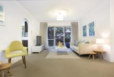  2/8 Chandos Street Ashfield NSW 2131 Peaceful and private garden apartment Fresh interiors, plentiful outdoor living space and a spacious layout give this ground floor apartment a cottage-like feel. One of only nine in the well-kept Locksley Hall, this 85sqm apartment benefits from direct level access to leafy common gardens and is just 450m to the station and Ashfield Park. • Quiet and private setting in a tightly held security block • Easy level access, an affordable alternative to a semi • 2 large bedrooms with built-ins and a leafy garden outlook • Freshly schemed interiors, separate living and dining zones • Bright and spacious kitchen with an adjoining laundry room • Paved outdoor dining terrace overlooking a leafy garden  • Easy internal access to a lock-up garage, low strata levies  • Bright and airy with potential to renovate and add value 