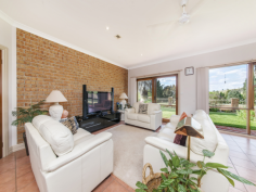  22 Davis Ct Murrumbateman NSW 2582 $1,050,000 It's Rural... It's Spacious... ...and it's one of Murrumbateman's finest homes. With room for the whole family, this stunning home is the perfect entertainer. From the moment you enter you are captivated with a sense of space and light - the sprawling single level design boasting five double sized bedrooms, the main with ensuite and walk in wardrobe, stylish cupboard filled kitchen, ducted gas heating, reverse cycle air conditioning, soft neutral decor, and sparkling bathrooms. Relaxation and entertaining is made easy with expansive living areas, including a large separate billiard room and impressive formal lounge and dining rooms. And outside is the ideal place to host a grand party, with not one but three built in BBQs and plenty of space for family and friends.  In addition there is a long list of quality features such as high ceilings to further expand the feeling of space, timber French doors, large picture windows to enjoy the stunning landscape and a perfect aspect to ensure the full benefit of the sun.  Outdoors, as well as the great entertaining area, is further enhanced with enormous park-like level grounds and a fruit filled orchard, the block size an impressive 1.099 hectares. There is plenty of space for children to run and play, ample accommodation for animals and valuable access for a boat, caravan and trailer with still plenty of visitor parking. Some of the many features include: - Impressive light filled sprawling design with high ceilings - Five double sized bedrooms with built in wardrobes - Main bedroom with huge ensuite with spa bath plus a walk in wardrobe - Formal lounge and dining rooms plus an open family room - Separate billiard room and bar area - Ducted gas heating - Reverse cycle air conditioning - Large floor to ceiling picture - Timber French doors featured throughout the home - Large cupboard filled kitchen - Back to base security system - Garaging for four cars with plenty of secure car accommodation and visitor parking - Expansive fruit bearing orchard - Access to almost 100,000 litres of drinking water - 50,000 litres of garden water available from the community dam - Reticulation throughout the park-like gardens  - Great private and quiet position within popular Dundoos Estate - Close to bridle path, Pony Club, Murrumbateman Village, bus services and with easy access back to the highway All the ingredients are here for your family to enjoy living a life of luxury -and this extraordinary package offers a rural lifestyle within 30 minutes of the CBD.  Rates: Currently $1277.52 per year Community title fees: $650 per year approx 
