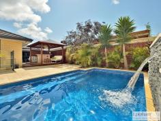  26 Kimberley Dr Secret Harbour WA 6173 Mid to high $500's property ID: 3688769 | property type: House SSSHHHH!!!! A STUNNING SECRET!!! THREE CAR GARAGE!!!! Available now - this fabulous quality Ross North built 5 year old home offers too much for too little! A whopping 296sqm under the roof!!!! External factors have caused the sellers to sell off their most precious and magnificent asset that they poured $$$$$ into to make it look like a display home. Comprising of large double door front entry with sensational feature wall, timber flooring, 3 brms PLUS an oversized, parent wing complete with retreat - leading directly into the pool area - and huge ensuite bathroom with twin vanities, bath tub and spacious shower. Second bathroom PLUS powder room, home theatre, family, computer/media room in the children’s wing. ducted air-conditioning throughout There is a Chef’s kitchen, 31course ceilings, laundry with cupboards. Alfresco number one is directly outside the family room and another huge separate Balinese inspired cabana/bar both of these outlook towards the deep blue swimming pool which has steel and glass fencing, offering views from the master room and family rooms. Limestone paving completes this gorgeous outdoor retreat.  A bonus small park across the road completes this magnificent safe family location. To buy a block and reconstruct this home again with all of the finishing touches as you see it will cost over $130,000-150,000 more so this has to be a terrific opportunity for one lucky appreciative family who want as new and all of these extra features without having to build. Will only be opened for private viewing to interested parties so please register now to have a time made available to you. Inspection will definitely not disappoint so be quick. Call Annie today. 