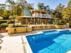  22 Leyburn Retreat Gidgegannup WA 6083 $710,000 Inspections Inspections by appointment only. Great presentation with this 4 bed, 2 bath + study, 2 storey Cedar and Iron home on mostly cleared 5 acres. Plenty of living space up and down stairs. Heating and cooling from 3 split system aircondioners through the home. Valley views across your 5 acres from the decked alfresco (approx 100sqm) for entertaining which leads to the sparkling blue pool that is enclosed with limestone retaining walls and glass security fencing.  Big man shed - 21m x 9m with concrete floor, power and rainwater tank. The shed has a separate 5m x 9m area that has been insulated with airconditioning as well as a hot water system. This could be used for teenager or home business with council permission.  2 rainwater tanks, 1 approx 100,000ltr and the other 150,000ltr. There is a bore to service the gardens.  The property is located at the end of a cul-de-sac and only 5 minutes to Gidge townsite. For Sale From $710,000 Features General Features Property Type: House Bedrooms: 4 Bathrooms: 2 Indoor Toilets: 3 Air Conditioning Other Features Large shed 