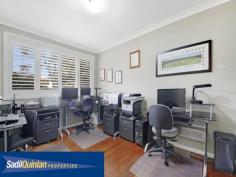  65 Denny St Latham ACT 2615 $800,000 Entertainers Delight Space. Light. Flexibly. Quality. Value. There are so many terms to describe this home. From high ceilings, expansive open plan living and entertainment areas to the northern rural outlook, this home has it all. Fully remodelled to a very high standard, the kitchen and bathrooms are a dream. A spacious light filled family, meals, kitchen area flows through French doors onto extensive timber decking. Segregated bedrooms, a huge laundry, music room, extra large rumpus or a studio with surround sound, extensive under house storage including a cellar and direct access to 4 car garaging. Displaying stunning panoramic bushland views over Umbagong Reserve and Ginninderra Creek from the living areas and decking. A sparkling, solar heated, in ground pool is overlooked by an all weather covered cabana area, ideal for alfresco dining. It is an entertainer's dream. Ideal for the growing or extended family.  Whether it is the birdlife, the breath taking sunsets overlooking the Brindabella, the light, space and other amenities, or simply a great place to live, in the owners words "It is a neighbourhood full of beautiful people and a tightly held secret. It is like living in the country with all the city's conveniences." Enjoy:  - Awesome views.  - 4 bedrooms with 1 study/office.  - 2 bathrooms that are fully renovated.  - Spa Bath.  - Wall to ceiling tiles.  - North facing.  - 3 large entertaining decks.  - Music room.  - Wiring for surround sound movie system.  - Huge Rumpus that can fit a billiard table.  - Wine Cellar.  - Storeroom / workshop.  - Huge family room including meals area.  - Recessed lighting.  - 4 car enclosed car accommodation with automatic roller door.  - Keyless remote entry.  - Reverse cycle air conditioning.  - Gigantic laundry.  - In ground salt water solar heated pool.  - Hardwood polished floors to living areas.  - Spacious modern kitchen with granite benchtops.  - Fish pond.  - Digital antenna.  - Foxtel Cabling. Do yourself a favour and come and look at this majestic home and compare the value and all the bonuses that you are getting compared to the new suburbs. This home is close to shops, public transport and schools yet it has a setting which is quiet and tranquil and that gives you a sense of peacefulness. For more information please call Greg Sadil on 0414 631 607 Energy Efficiency Rating: 2.0-star NABERS Energy Rating For Sale Offers Over $800,000 Features General Features Property Type: House Bedrooms: 5 Bathrooms: 2 Indoor Study Floorboards Built in Wardrobes Rumpus Room Reverse cycle Air Conditioning Outdoor Remote Garage Secure Parking Garage Spaces: 4 Deck Outdoor Entertaining Area Fully Fenced Swimming Pool - Inground Eco-friendly Inspections Inspections by appointment only. 