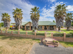  22 Davis Ct Murrumbateman NSW 2582 $1,050,000 It's Rural... It's Spacious... ...and it's one of Murrumbateman's finest homes. With room for the whole family, this stunning home is the perfect entertainer. From the moment you enter you are captivated with a sense of space and light - the sprawling single level design boasting five double sized bedrooms, the main with ensuite and walk in wardrobe, stylish cupboard filled kitchen, ducted gas heating, reverse cycle air conditioning, soft neutral decor, and sparkling bathrooms. Relaxation and entertaining is made easy with expansive living areas, including a large separate billiard room and impressive formal lounge and dining rooms. And outside is the ideal place to host a grand party, with not one but three built in BBQs and plenty of space for family and friends.  In addition there is a long list of quality features such as high ceilings to further expand the feeling of space, timber French doors, large picture windows to enjoy the stunning landscape and a perfect aspect to ensure the full benefit of the sun.  Outdoors, as well as the great entertaining area, is further enhanced with enormous park-like level grounds and a fruit filled orchard, the block size an impressive 1.099 hectares. There is plenty of space for children to run and play, ample accommodation for animals and valuable access for a boat, caravan and trailer with still plenty of visitor parking. Some of the many features include: - Impressive light filled sprawling design with high ceilings - Five double sized bedrooms with built in wardrobes - Main bedroom with huge ensuite with spa bath plus a walk in wardrobe - Formal lounge and dining rooms plus an open family room - Separate billiard room and bar area - Ducted gas heating - Reverse cycle air conditioning - Large floor to ceiling picture - Timber French doors featured throughout the home - Large cupboard filled kitchen - Back to base security system - Garaging for four cars with plenty of secure car accommodation and visitor parking - Expansive fruit bearing orchard - Access to almost 100,000 litres of drinking water - 50,000 litres of garden water available from the community dam - Reticulation throughout the park-like gardens  - Great private and quiet position within popular Dundoos Estate - Close to bridle path, Pony Club, Murrumbateman Village, bus services and with easy access back to the highway All the ingredients are here for your family to enjoy living a life of luxury -and this extraordinary package offers a rural lifestyle within 30 minutes of the CBD.  Rates: Currently $1277.52 per year Community title fees: $650 per year approx 