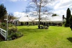  269 Dingup Road Manjimup WA 6258 $1,495,000 HISTORY NEVER TO BE REPEATED!! TWO HOMESTEADS! 45 ACRES! House - Property ID: 814655 Rare chance to live the country life dream on an historic property settled in 1870. Dingup House is one of few surviving homesteads in this part of the South West. The main homestead, huge barn and shearing shed have been lovingly restored. This historic home has an excellent commercial kitchen, 30 seat dining room with huge log fireplace, magnificent lounge room with wood fire, charming parlour room, 6 bedrooms and 5 bathrooms an office and much more. Adjacent and joined by a breeze way to the main homestead are separate living quarters. This incredible home is surrounded by sweeping lawns, a grass tennis court, many deciduous trees, and cottage gardens, all reticulated from a very good dam. This amazing property has huge potential having been run as a very successful Bed and Breakfast and Restaurant in the past. Dingup House would make a perfect Retreat, there is potential to build chalets and capitalise on the self contained accommodation market, these are just a few of the potential uses for this incredible property. Situated on the same property is a new three bedroom two bathroom plus office, home with open plan living area with galley ceilings and black butt flooring, nice verandahs and entertaining timber deck. Also on the property is a massive shed with 3 phase power, which is over 900sqm in size.  This rare Heritage property must be seen to be fully appreciated. Please call Kathy Savage on 0417 965 923 for further details.   Print Brochure Email Alerts Features  Land Size Approx. - 18.18 hectares  Fireplace(s)  Garden  Polished Timber Floor  Formal Lounge  Separate Dining  Historic  Stunning gardens 