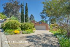  6 Minehan Pl Calwell ACT 2905 Positioned in one of Calwells best locations, with outstanding Views! With the owners moving north an outstanding opportunity exists for one lucky buyer to purchase an impressive home. Set aside some time to come and view this immaculate property. Located in an elevated quiet cul-de-sac on a large but maintenance friendly 1,603m2 block, this is an striking home of design and construction. Exceptional views to the north are the first thing to capture your attention but to truly appreciate this home you need to have a look inside. Split level living at its finest with four double sized bedrooms, study, lounge, dining, family, rumpus and living rooms. With good quality floor covering, fitting and fixtures this home is sure to please the astute purchaser. When venturing outside you will be amazed with not just the views but the impressive attention to detail with an outstanding garden with many chill out zones • First time offered for sale • 	 Large home with four bedrooms and ensuite and rumpus room. • 	 Huge 1603m2 parcel of land with views to Black mountain tower • 	 Flexible floorplan complete with a variety of living areas • 	 North facing solar passive living areas with views • Large paved outdoor living area • 	 In-floor zoned heating  • 	 Bay window meals area • 	 Large kitchen with breakfast bar and gas cooking • 	 Extra-large double garage with internal access and remote control doors • 	 Immaculate condition inside and out Residence 271.79m2 Garage 55.25m2 Total 327.04m2 Inspection is highly recommended! Additional Information Land Area (approx) 1603 sqm Building Size (approx) 327.04 sqm Energy Rating 2.0 