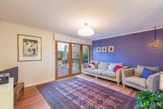  8 Service St Curtin ACT 2605 Don't be late! Location and absolute convenience can be found here. Just a stroll to Woden town centre and surrounded by some of Canberra's great restaurants and cafes. With outdoor entertaining areas a plenty and private studio/teenagers retreat, this house is sure to please.  This well presented 3 bedroom home is situated on the high side of the street and offers great views from the large front entertaining deck across to Hughes Hill. Tastefully renovated with solid hardwood timber floors, spacious open plan living area and lounge, flowing through to the large entertainment timber decks both front and back. Enjoy a functional updated kitchen with modern gas cooker, oven and dishwasher and ample cupboard and drawer space. Sit at the kitchen breakfast bar and look out over the view as the sun shines in through the front ash timber tri-fold doors. Renovated laundry/powder room including built-in front load washing machine and second toilet with external access. Reap the benefits of solar panels with cheap, next to non-existent electricity bills. Keep warm in the winter with newly installed ducted gas heating with thermostat and keep cool in the summer with the efficient ducted evaporative cooling, the only cooling to have in a dry hot place like Canberra in summer. This house has you covered for all seasons. Easy-care gardens including a 5000 litre water tank with watering system, a veggie patch and chicken pen. Bonus! Cosy solid timber traditional yurt out the back provides a unique extra bedroom, teenagers retreat or studio. A wonderful home with unique features and amazing location. Features include: - Renovated throughout - Solar panels - Solid hardwood timber floors throughout - Spacious open plan living areas - Updated kitchen with breakfast bench, gas cooker & dishwasher - French doors to back deck - Timber tri-fold front doors opening onto the merbau  - Paved entertainment area - Second toilet in laundry/powder room - Renovated laundry with front loader washing machine  - Yurt in backyard - perfect as an art studio or additional bedroom - Gas ducted heating - Ducted evaporative cooling - Gas cooking - Generous storage throughout home - Instant gas endless hot water - Veggie patch area - Chook yard - 5000 litre water tank with watering system - Beautiful established gardens - Double garage currently converted to office and workshop - Wonderful location only minutes' walk to Woden town centre - Lovely quiet street - Phillip Pool & Southern Cross gym just across one road EER: 1 Land Size: 815m2 (approx.) Land Rates: $2,428pa (approx.) UV: $454,000 Inspection Times: 12.15PM - 12.45PM Saturday, 17 October 2015 Auction Time: 02.00PM Saturday, 07 November 2015 Land Size (approx.): 815 Sqm Rates (approx.): $2,428pa (approx.)  EER: 1.0  Unimproved Value (approx.): $454,000 