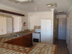  18 Wilga St Blackwater QLD 4717 Light Industrial Land, 2001m2 Block! Set on 2001m2 (approx) of light industrial land in Wilga St, Blackwater is this property with 6 bedrooms, lounge, 2 x kitchens and 2 bathrooms! 3 large shed joined onto the back to make the possibilities endless. With some renovating required, you can personalize your business/home. Features Include; ? 2 x Kitchens  ? 6 x Bedrooms  ? 2 x Bathrooms  ? Open Lounge Area  ? Outdoor Entertaining Area  ? 3 Good Sized Workshops  ? Offices in each Workshop  ? Living Quarters on Property  ? Fully Fenced Yard with Gates  ? 2,001m2 (approx) Light Industrial Land This type of property on light industrial land could have a lot of benefits with workshops, offices and bedrooms all tied into one! Inspections Inspections by appointment only. For Sale Auction Date & Time Fri, 04 Dec 11:00 AM - Auction Auction Features General Features Property Type: House Bedrooms: 6 Bathrooms: 2 Land Size: 2001 m2 (approx) Indoor Toilets: 2 Outdoor Carport Spaces: 1 Garage Spaces: 3 