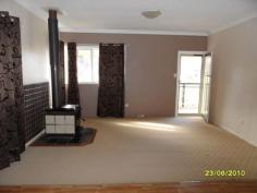  20 Granite St Stanthorpe QLD 4380 Don't want a unit? Well here is the ideal alternative for you!!! A definite sale is wanted as owners plans have changed - reduced to $215,000 neg. Tucked away on easy care fenced 807m2 with such an easy stroll to town and to Quart Pot Creek Parklands and walkways. Just a great location! It has all town services - low maintenance in top condition - 2 built in bedrooms, open plan living area with wood heater - good up to the mark kitchen and bathroom with laundry- top presentation and quality. Great covered rear full length verandah plus front deck with perfect N/E aspect - these areas give extra living and outdoor space! Double lock up shed with power, concrete floor and one remote controlled door with storage plus extra L/U adjoining storage space!. Easy to look after grounds with attractive granite boulders adding to its local appeal. This is a top spot - stroll to parklands and walkways and on to town! Excellent tenant paying $230 per week til early November with strong possibility to wish to continue! So ideal to live or as investment plus the prefect weekender - enjoy, then close the doors! Walk to everything!. Easy care - ideal town living with low maintenance - very central location yet hidden and private! Here is a great opportunity for an alternative to unit living - position, property and price! Now just $215,000. Call Anne Lindsay on 0418 737309. #9095 Features Low maintenance Smoke Alarms   	 Fenced Undercover outdoor area Safety Switch Property Details Bedrooms 		 2 Bathrooms 		 1 Garages 		 2 Land Area 		 807 m2 